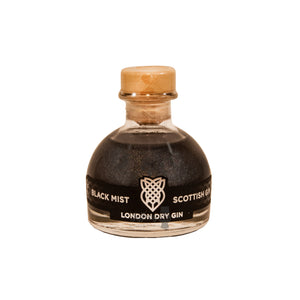 A 5cl bottle of Black Mist Scottish Gin London Dry gin